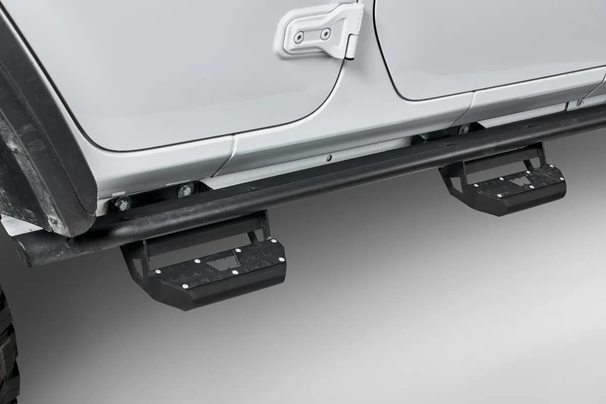 WARN - These super-strong Rock Sliders for 2018-2024 Jeep Wrangler Unlimited JL help protect the vehicle's rocker panels from trail hazards. Made of thick st