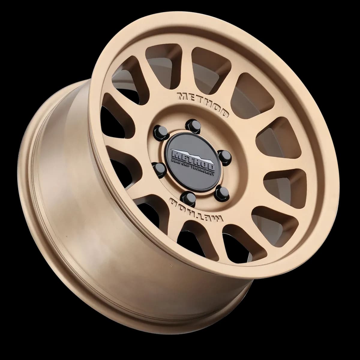 Aluminum Wheels 17x8.5 Bead Grip MR703 Bolt Pattern 6 On 139.7 Offset 0 Lip Size 1.18 Method Bronze BRZ Method