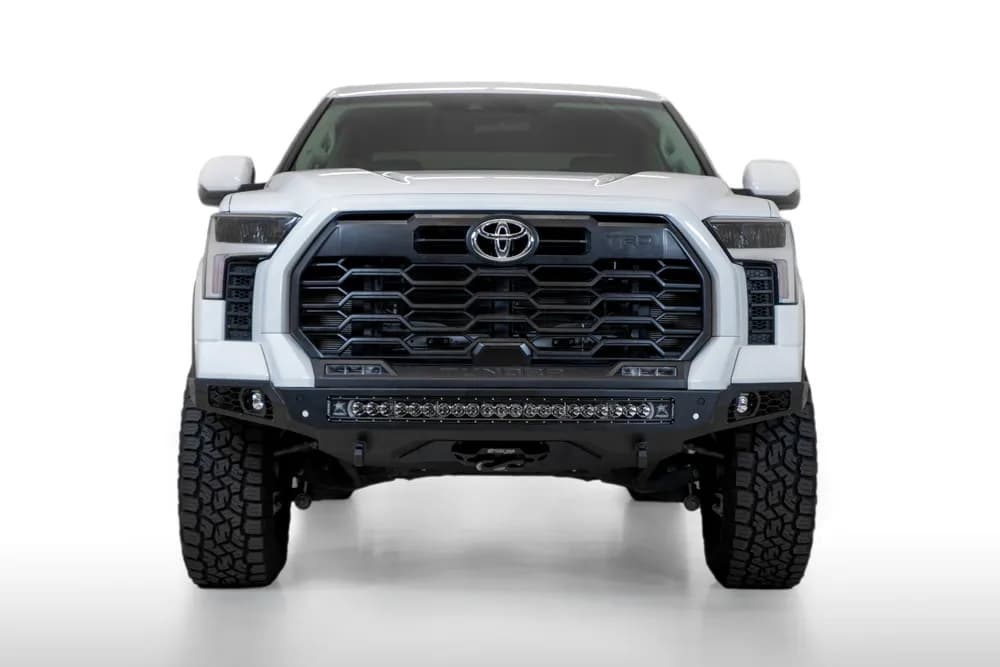 Stealth Fighter front bumper for the 2022-2023 Toyota Tundra is an aggressive modern radius plate design that fits tight around the Tundra s frontend. A steel plate design provides additional protection and a winch mount provides additional utility for yo