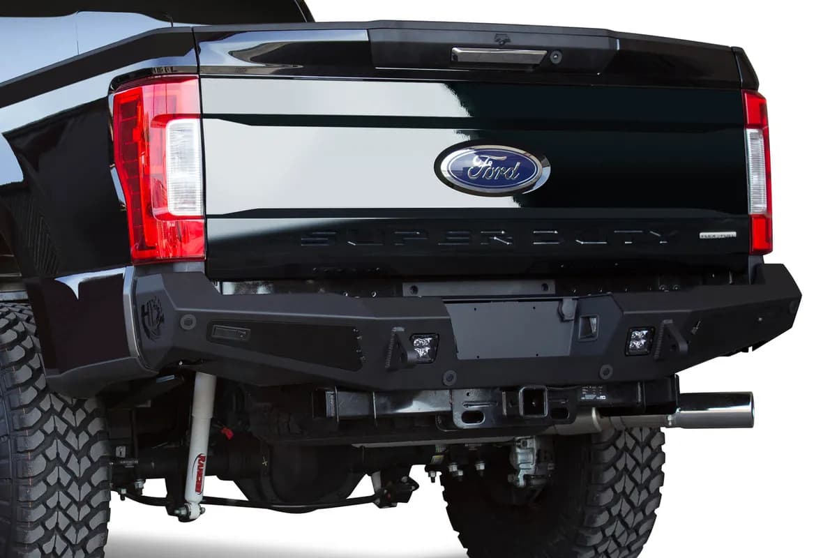 Ford F250 2017 - up HoneyBadger Rear Bumper with Integrated Tool Boxes on Sides with D-Ring Clevis Mounts and Mount Tab for Dually with Back Up Sensor Holes in Hammer Black with Satin Black Panels