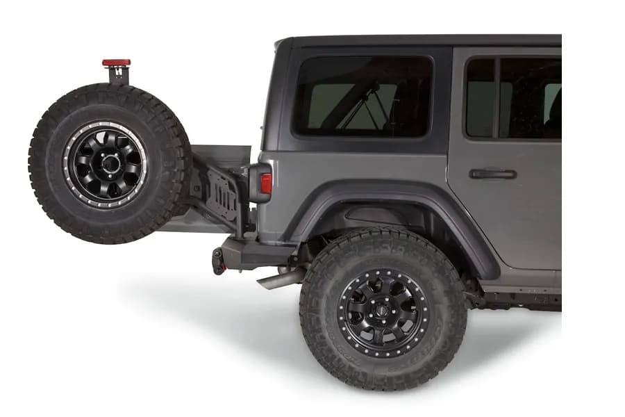 WARN - Mounts to Elite Rear Bumper and can accommodate up to a true 40-inch tire. Made of durable black steel and wearing a corrosion-resistant powder-coated