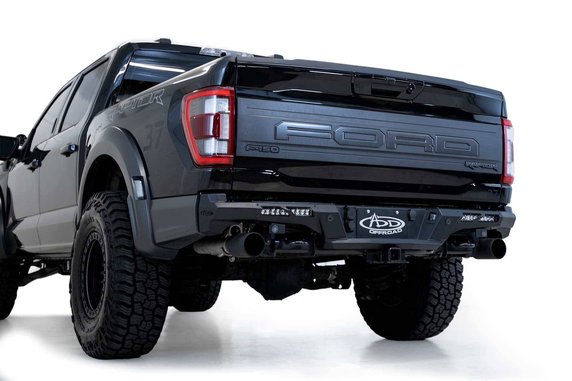 Made with plate steel and constructed in a modern box design the Phantom Raptor Rear Bumper provides superior protection over the factory option. It s designed to flow with the Raptor s rear body style and its wings flare out in a unique hammerhead styl