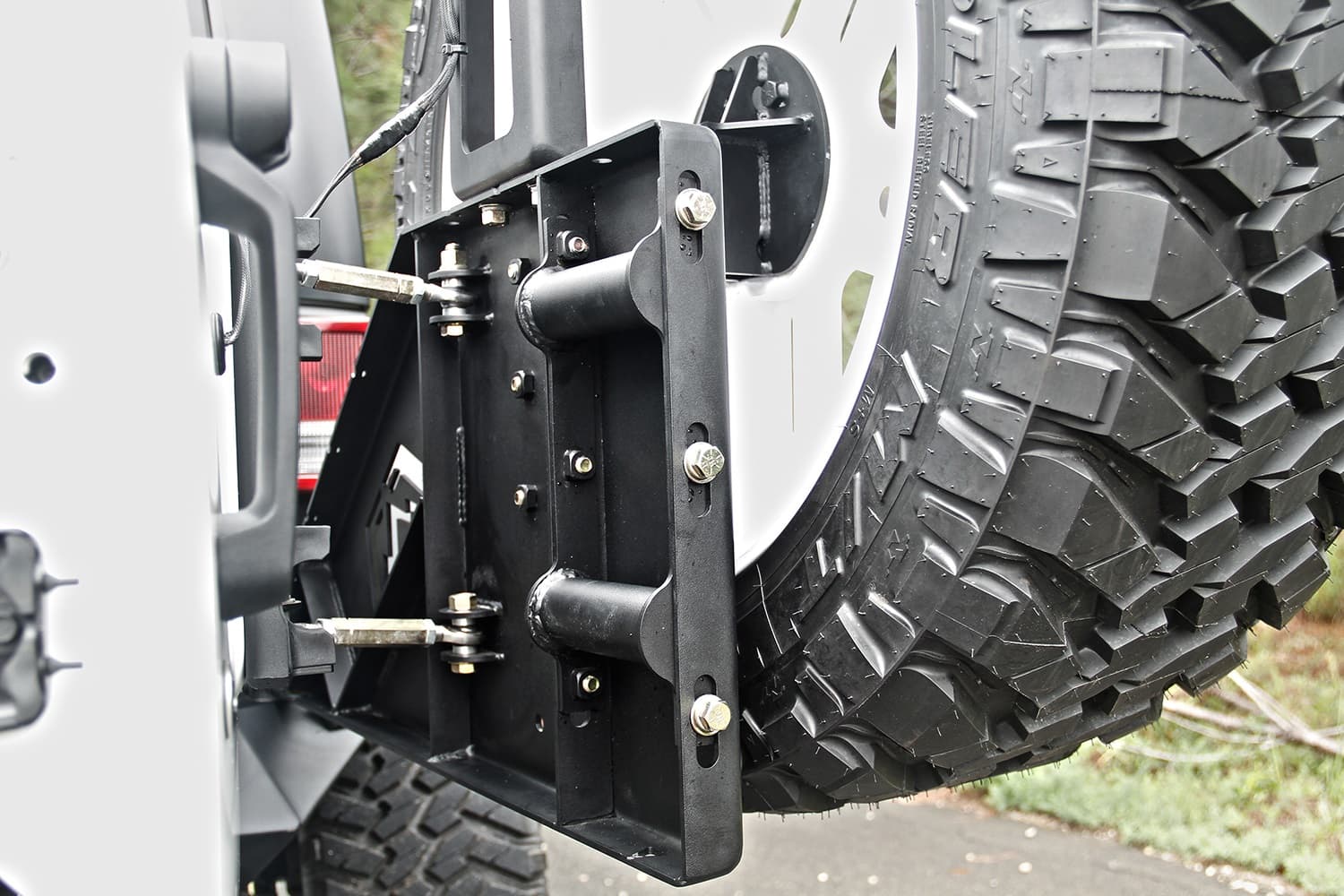 Fab Fours Off The Door Tire Carrier; 2 Stage Black Powder Coated; Needs Base Bumper;