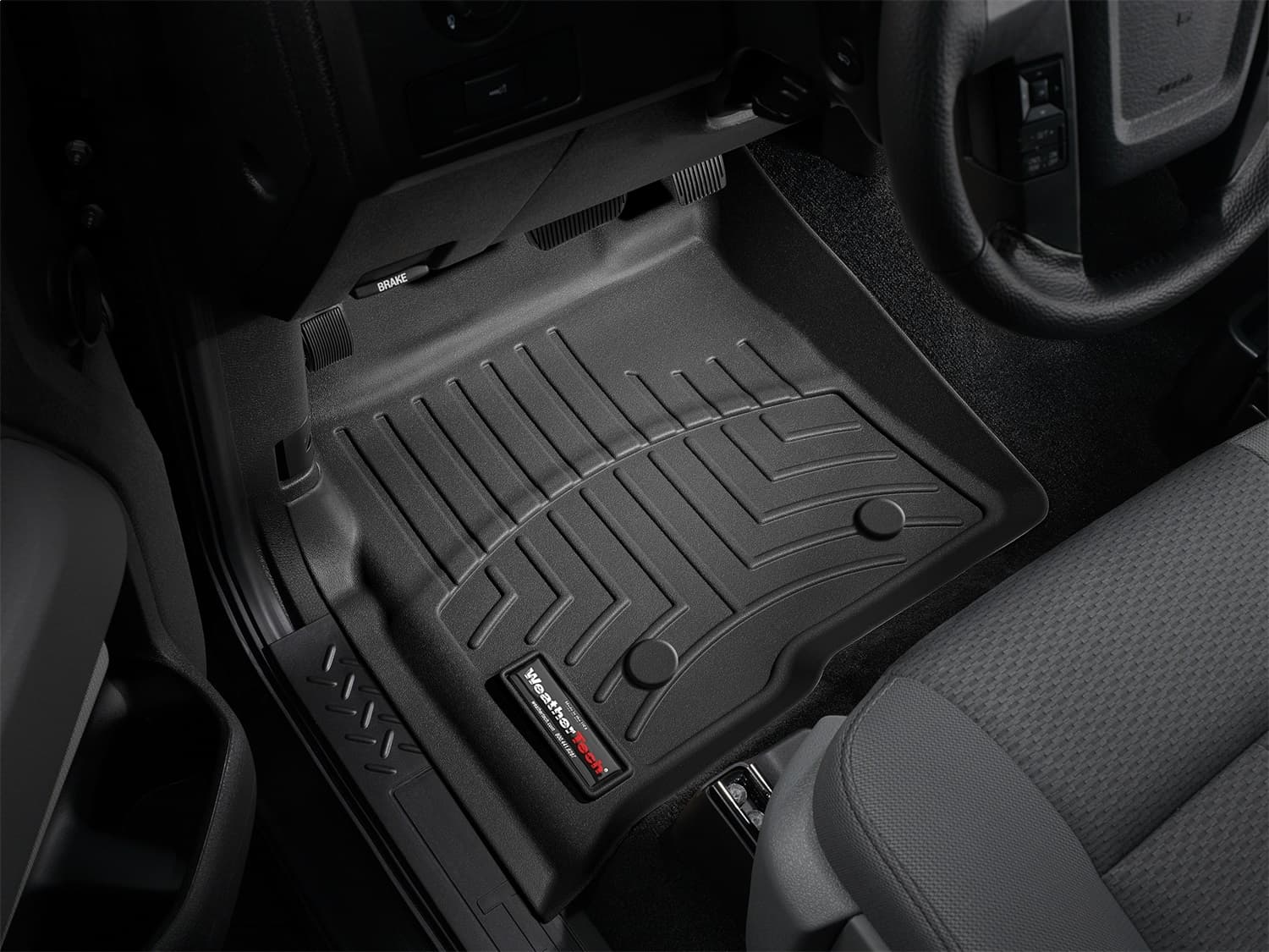 Black Front FloorLiner Ford F150 2009 - 2014 Fits models with 1st row under seat heading vents; does not fit models with floor-mounted 4x4 shifter; fits vehicles with dual floor posts product image